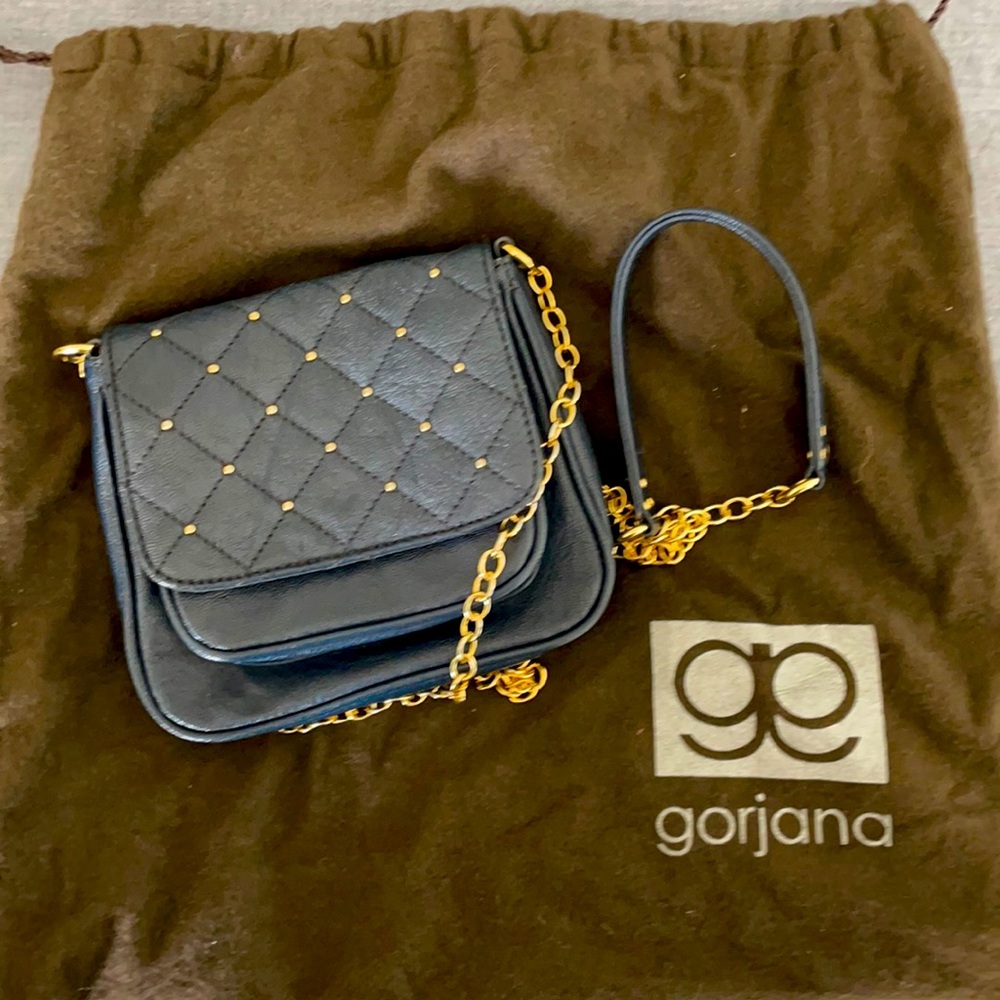 Gorjana blue leather handbag.